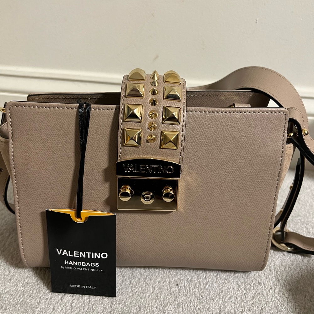 Brand new never used Valentino Leather Bag in a nude color.